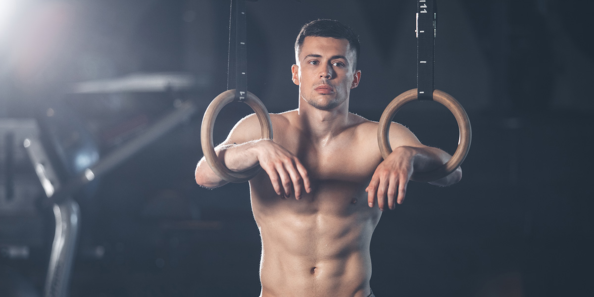 Shirtless Buff Guy on Rings